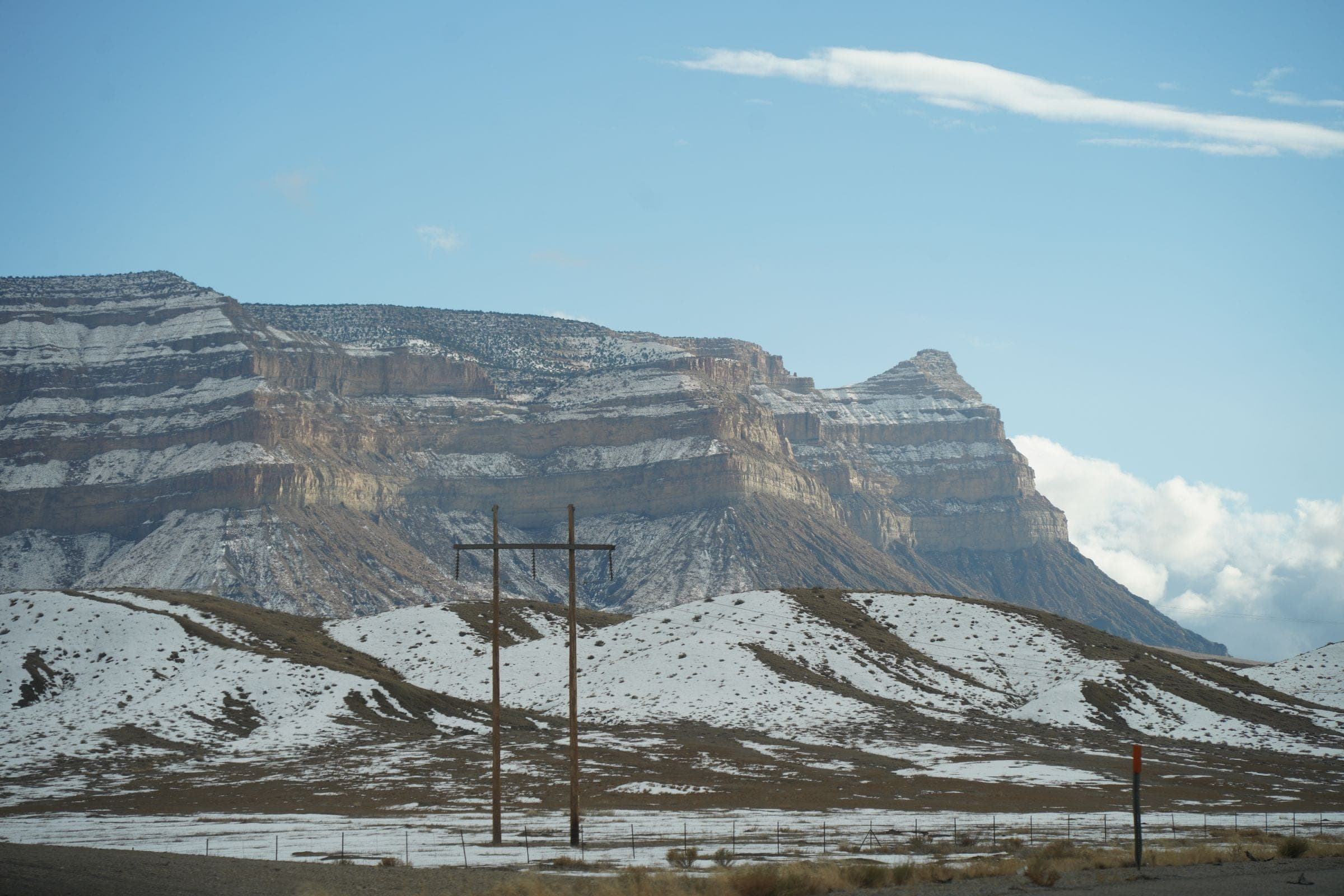 Snow-dusted cliffs above the valley at Parachute, CO