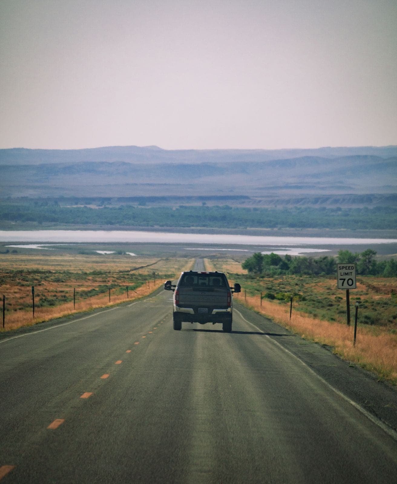 Pickup truck on an open road